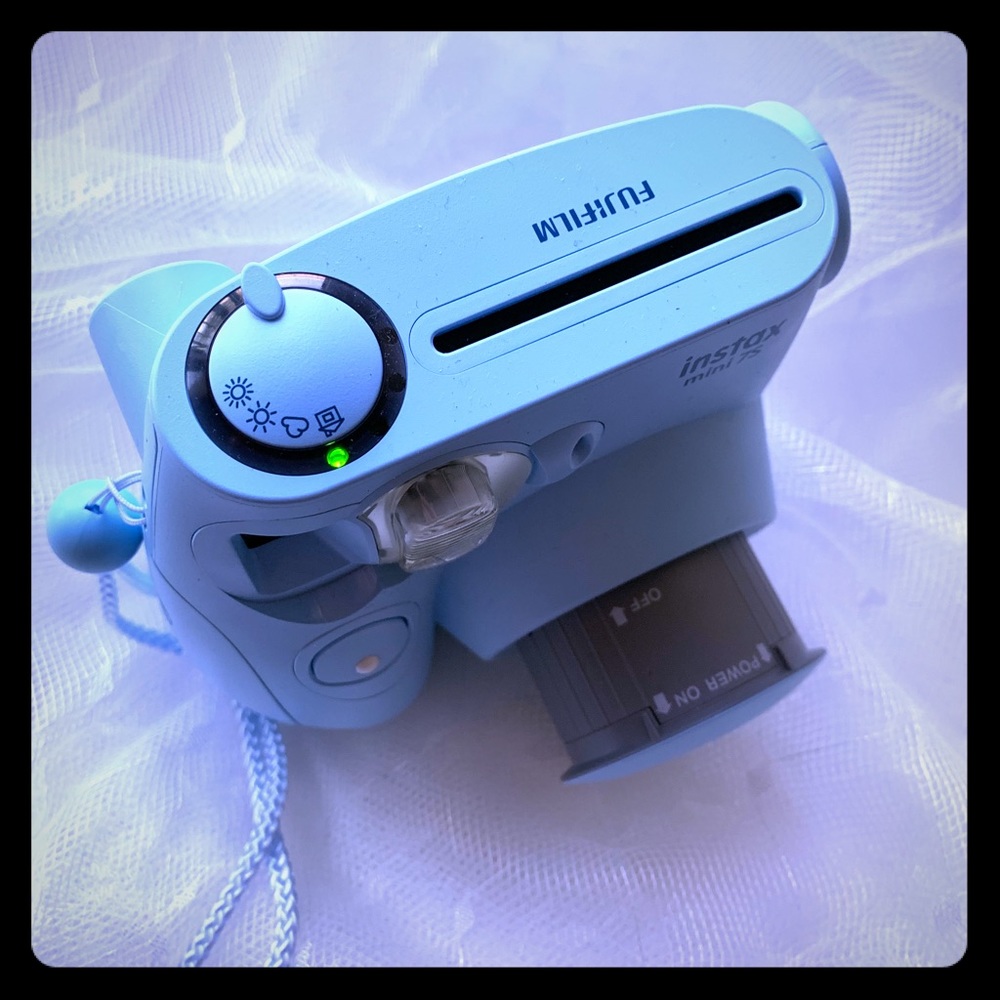 Instead mini camera with photo album